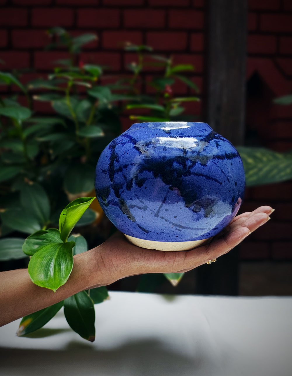 Blue_Globe_vase_INHAND